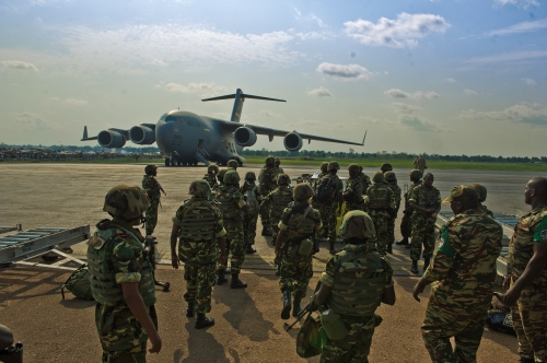 Burundi soldiers gather their gear at the Bangui Airport, Central Africa Republic on December 13th, 2013, after having arrived in a US Air Force C-17 Globemaster III transport.