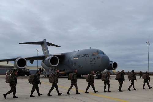 French soldiers march to a U.S. Air Force C-17 Globemaster III at Base Aerieene 125, Istres, France on 20 January 2013, as they prepare to depart for Mali as part of France's Operation Serval