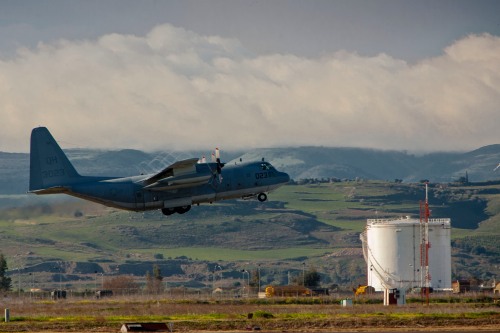 A KC-130T Hercules carrying Marines and sailors with Special-Purpose Marine Air-Ground Task Force Africa 13 takes off from NAS Sigonella on route to a security cooperation engagement in Burundi on February 16, 2013. 