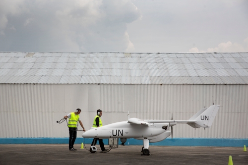 A team of technicians prepare a Falco unmanned aerial vehicle for the inaugural flight in Goma, North Kivu province, during an official ceremony organized in the presence of Under Secretary General for Peacekeeping Operations, Herve Ladsous, on 3 December 2013.