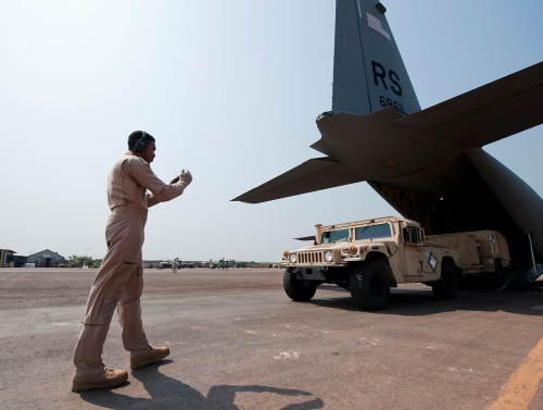 USAF personnel unload equipment belonging to SETAF's Headquarters Support Company from a C-130 aircraft in Central African Republic's capital Bangui on December 20th, 2013.
