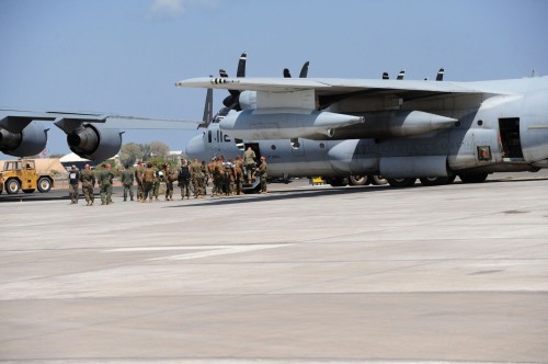 Members of Special Purpose Marine Air Ground Task Force - Crisis Response board a KC-130J at Camp Lemonnier, Djibouti, as they prepare to return to their base in Spain on 1 March 2014.