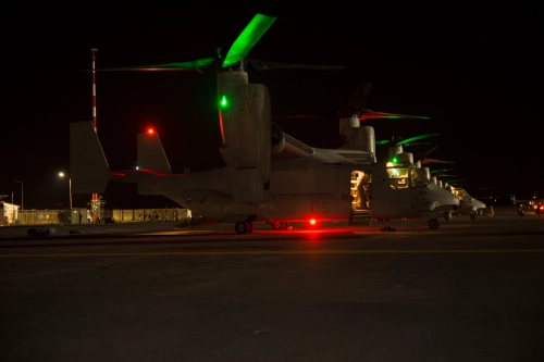 MV-22B Ospreys from Special Purpose Marine Air Ground Task Force - Crisis Response sit on the ramp at Naval Air Station Sigonella, Italy as Task Force Tripoli prepares to depart for a Non-Combatant Evacuation Operation in the early hours of 26 July 2014.